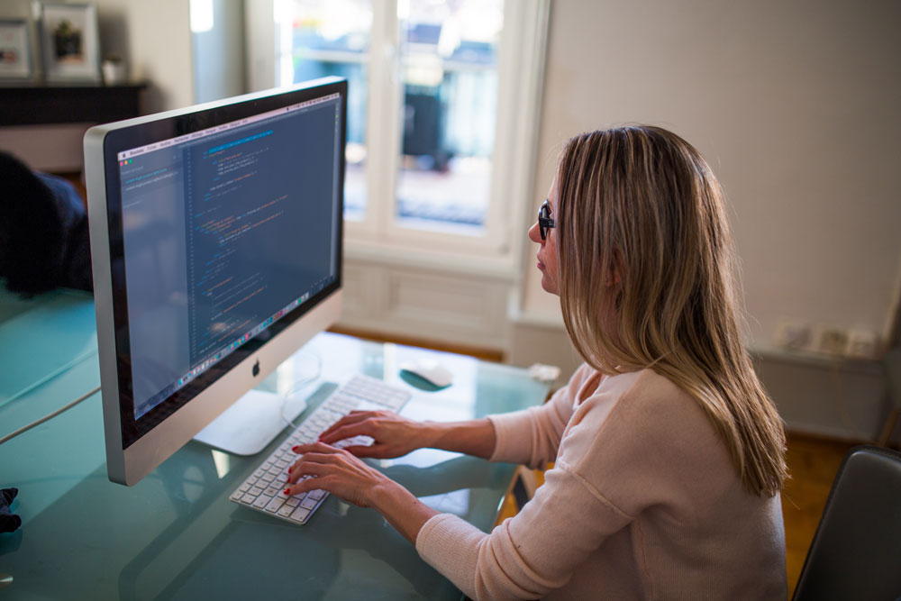 female programmer at her computer