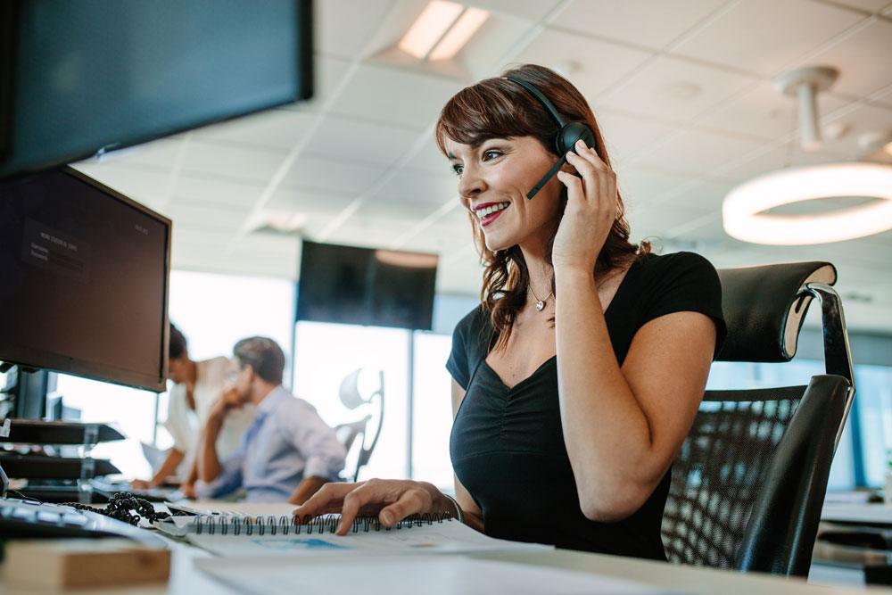 smiling woman at call center