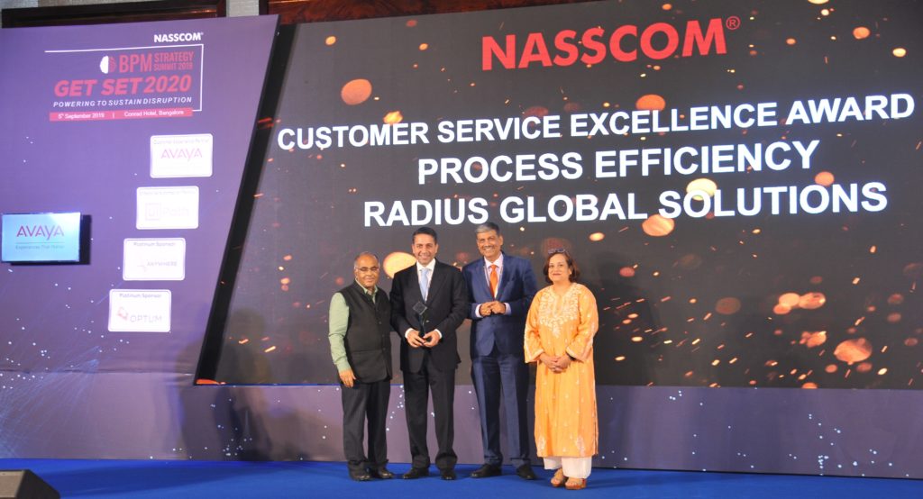 radius team accepting nasscom customer service award