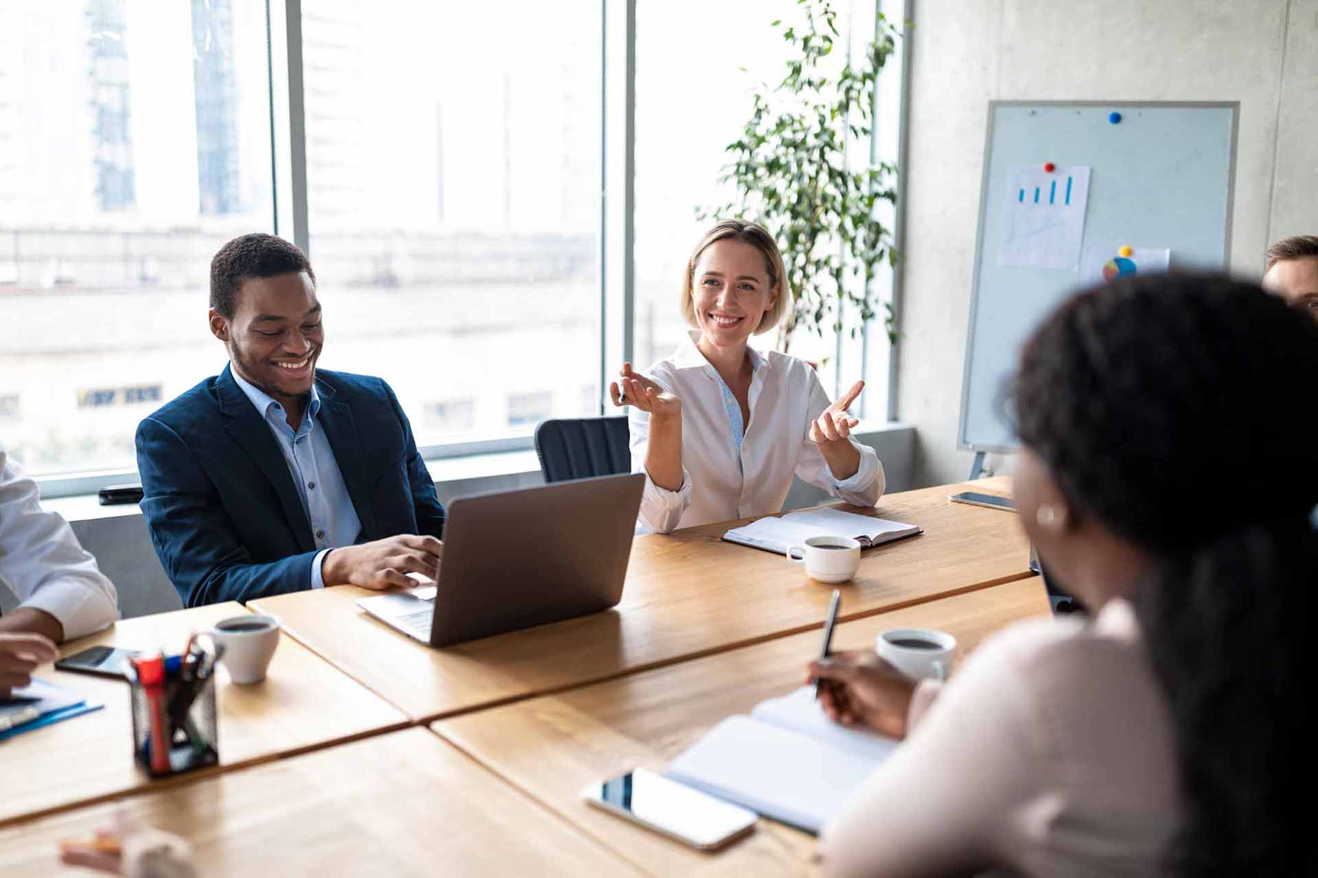 happy employees in a meeting