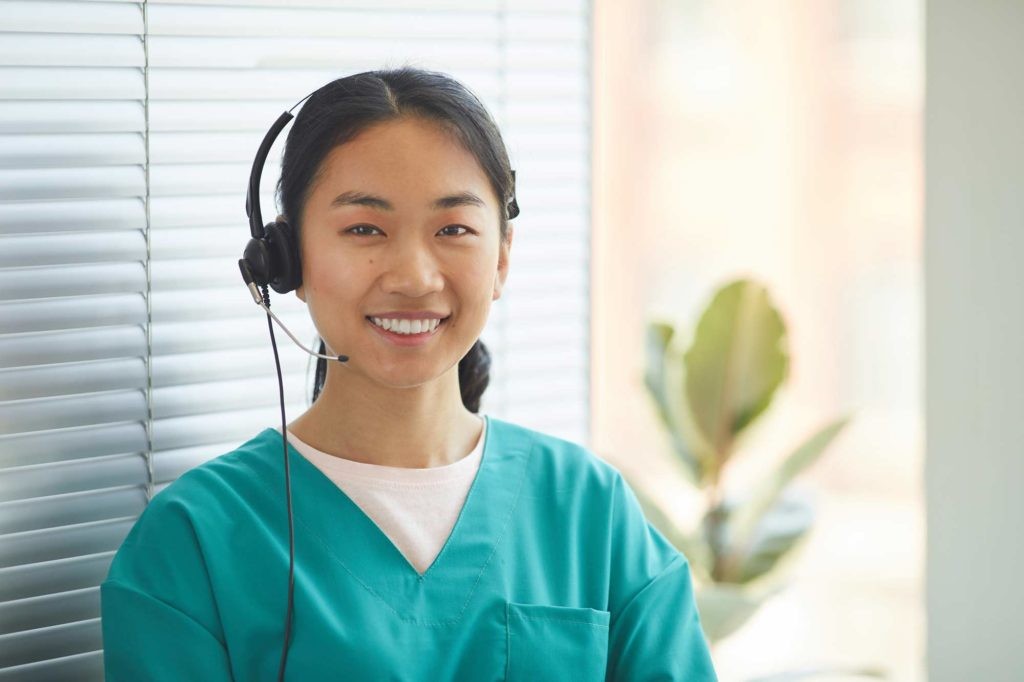 call center operator in nurse scrubs