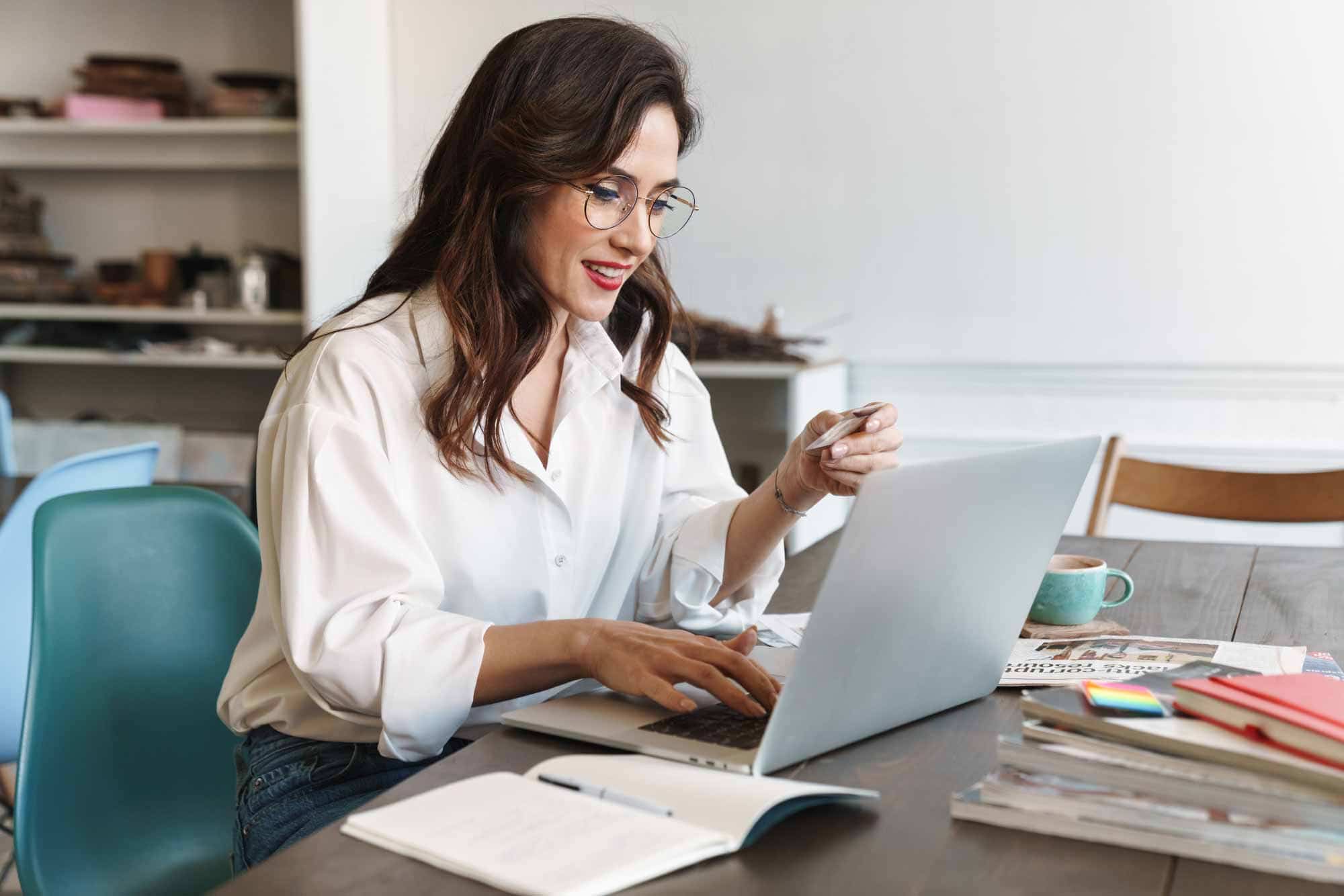 woman with glasses shopping online