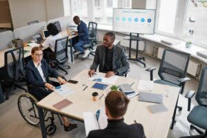 diverse employees holding a meeting