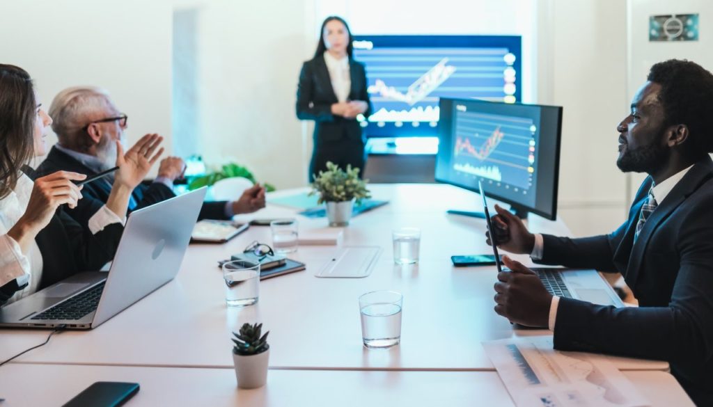 fintech team strategizing in conference room