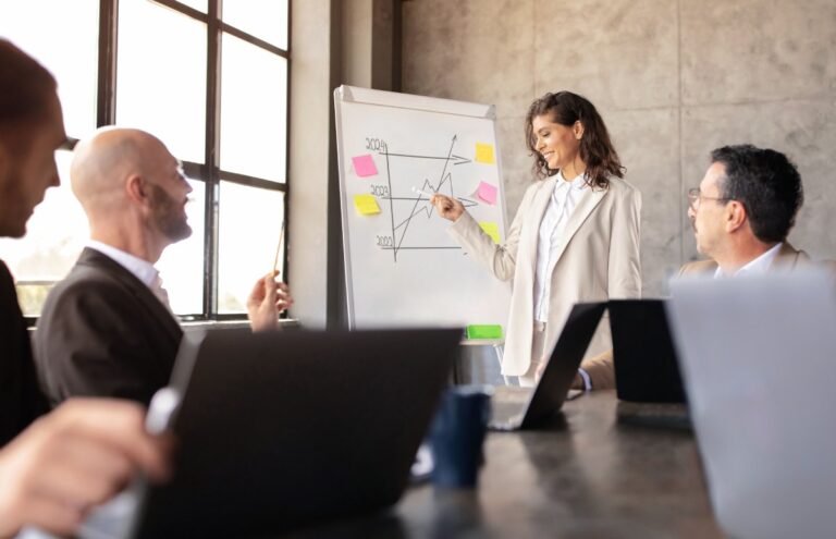 business person giving presentation on growth plan for 2024