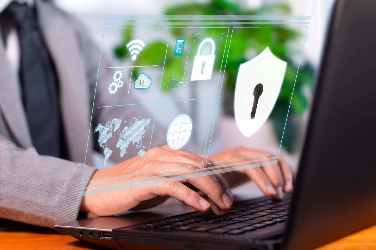 cybersecurity graphic on laptop